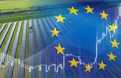  Bandeira da União Europeia com um gráfico de crescimento sobre vários paineis solares. Crédito: Scharfsinn