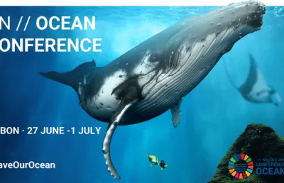 imagem de um cartaz com uma baleia, que promove a segunda Conferência dos Oceanos das Nações Unidas . Crédito: Página oficial do Turismo de Portugal.