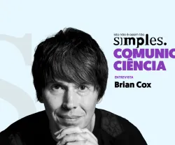 Imagem de Brian Cox, texto: "COMUNICAR CIÊNCIA - ENTREVISTA". Fundo azul claro.
