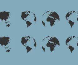 A imagem mostra vários globos terrestres lado a lado, sob um fundo neutro. Crédito: Shutterstock